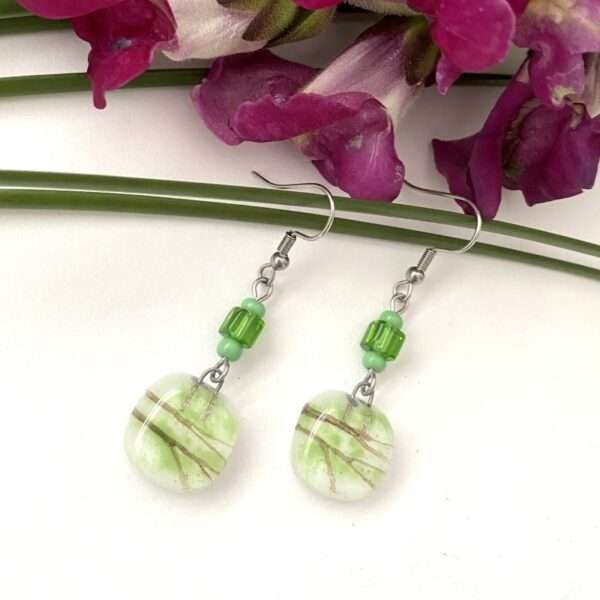 aretes verdes con cafe