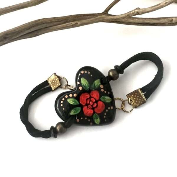 pulsera corazón negro con rosa