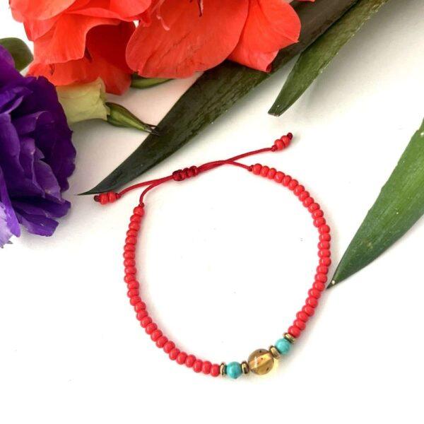 pulsera roja con ámbar