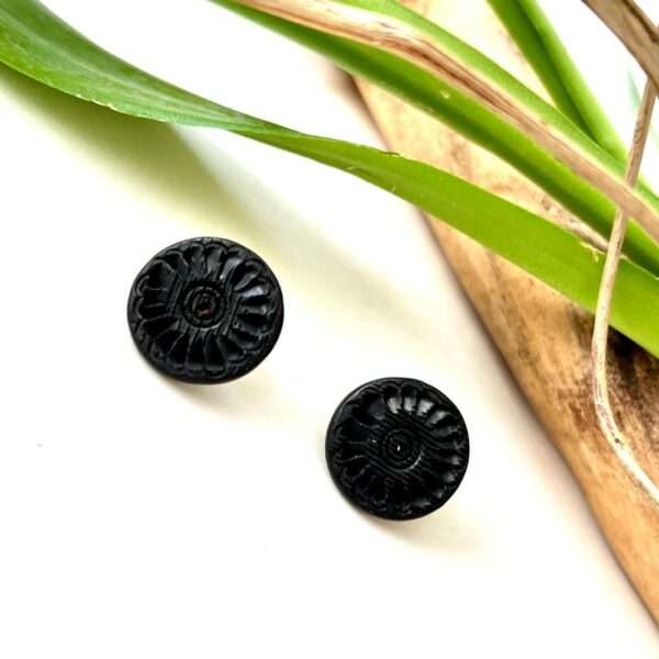 aretes barro negro redondos