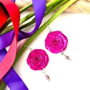 aretes hoja de palma flor fucsia