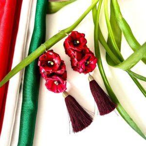 aretes hoja de palma rojos con borla