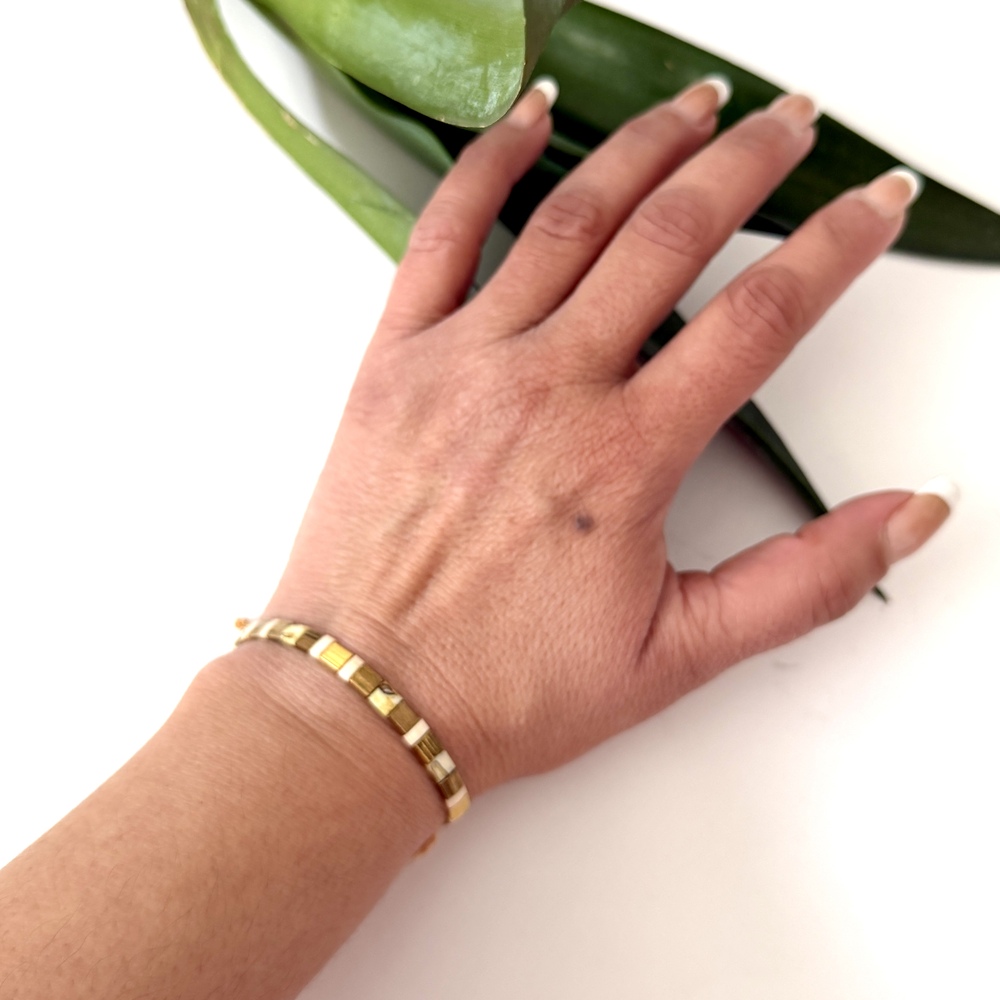 pulsera tila tierra dorada